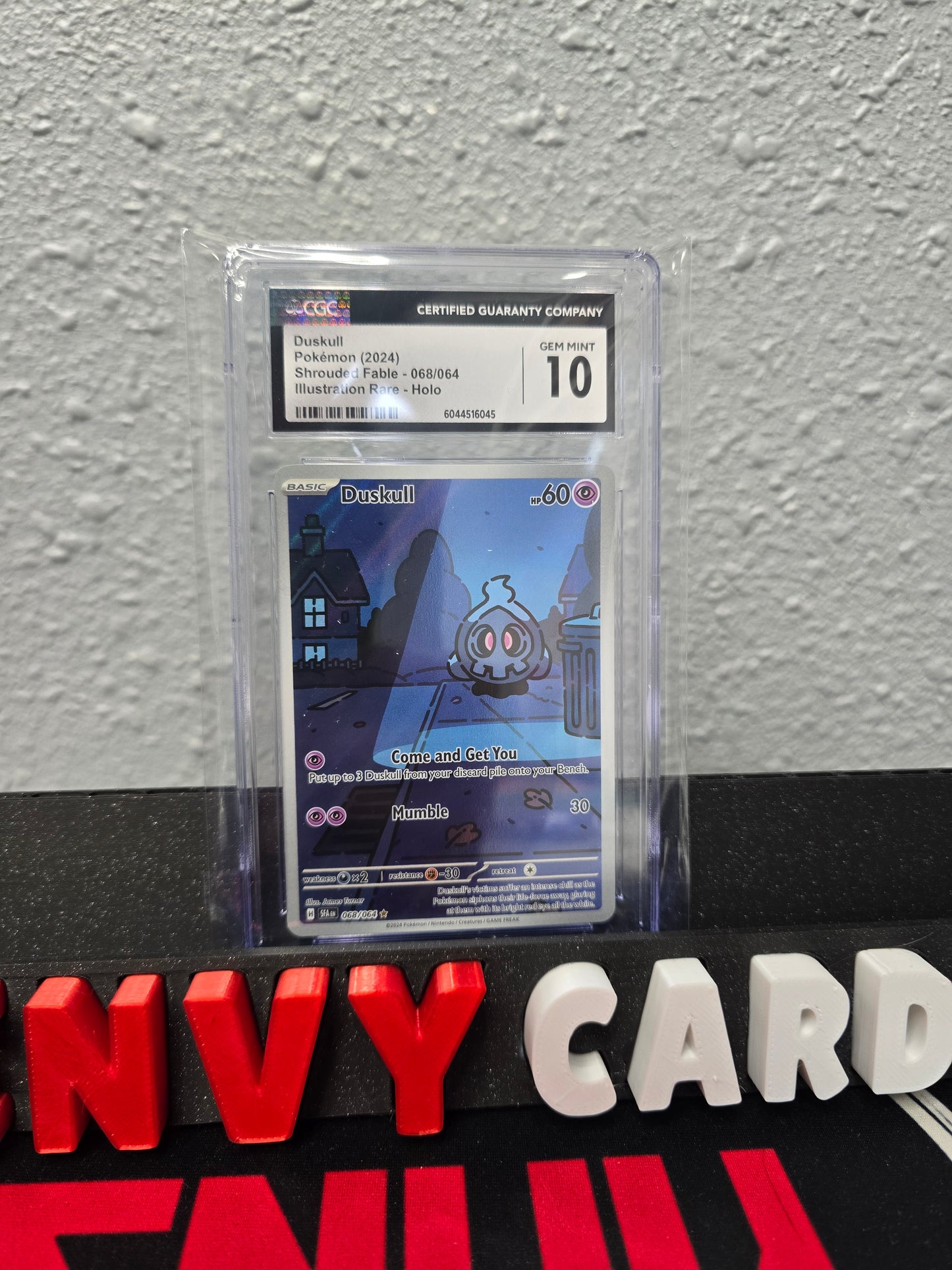 Duskull 068/064 IR Shrouded Fable CGC 10